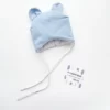 зимняя шапка для новорожденного